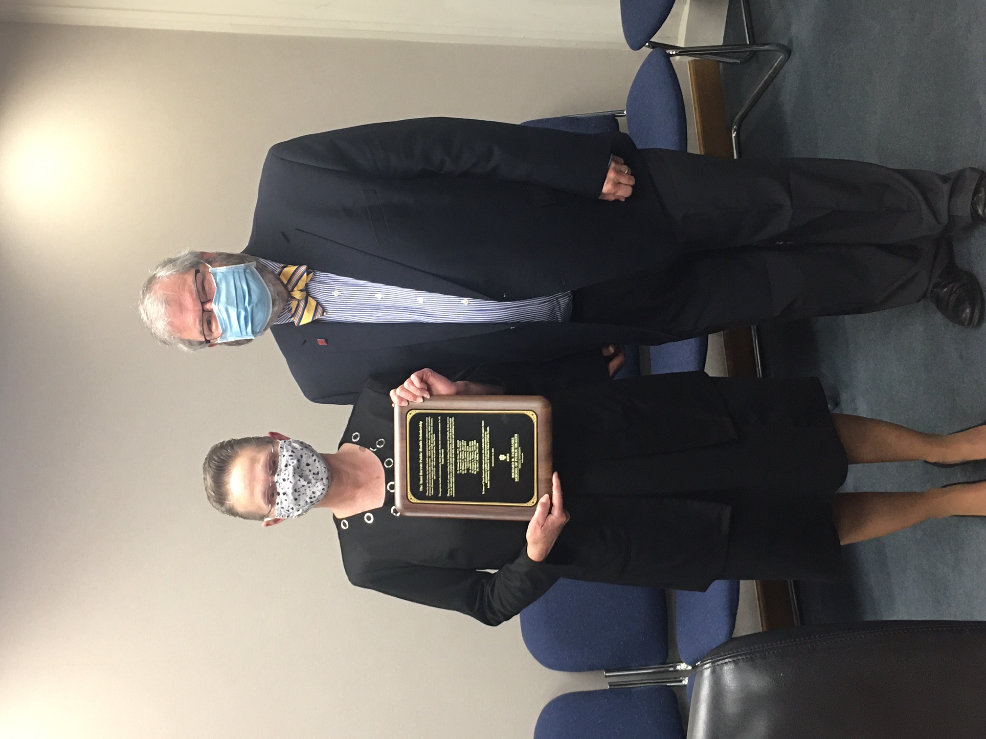 Tami Barrett poses with award alongside Paul Halverson